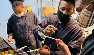 Chef McKinley Pierce teaches culinary skills to students in the local Boys & Girls Club. Photo courtesy McKinley Pierce