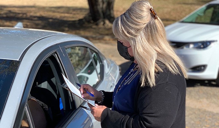 A line of cars waits at one of the drive-thru clinics available throughout the state. Vaccinations are free, and Mississippians can make appointments online or by phone. Photo courtesy Mississippi Department of Health