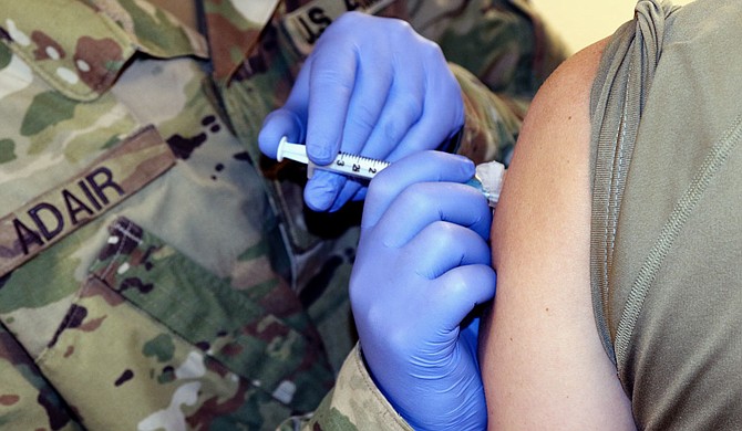 The Mississippi Health Department said Wednesday that the state cannot take any more appointments for COVID-19 vaccinations because of a “monumental surge” in demand after Gov. Tate Reeves announced that more people were eligible. U.S. Army National Guard Photo by Sgt. Scott Tynes