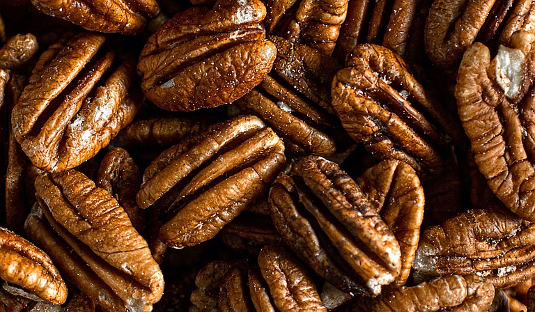 House Bill 284 would set stricter penalties for stealing pecans. Current law sets a penalty of up to $100 and 30 days in jail. The bill would set fines of $1,000 to $10,000 and imprisonment of six months to 10 years. Photo by Sara Cervera on Unsplash