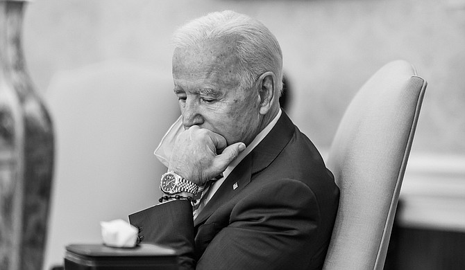 With sunset remarks and a national moment of silence, President Joe Biden is planning a head-on acknowledgement of the country's once-unimaginable loss—half a million Americans in the COVID-19 pandemic—in striking contrast to the approach of his predecessor. Official White House Photo by Adam Schultz