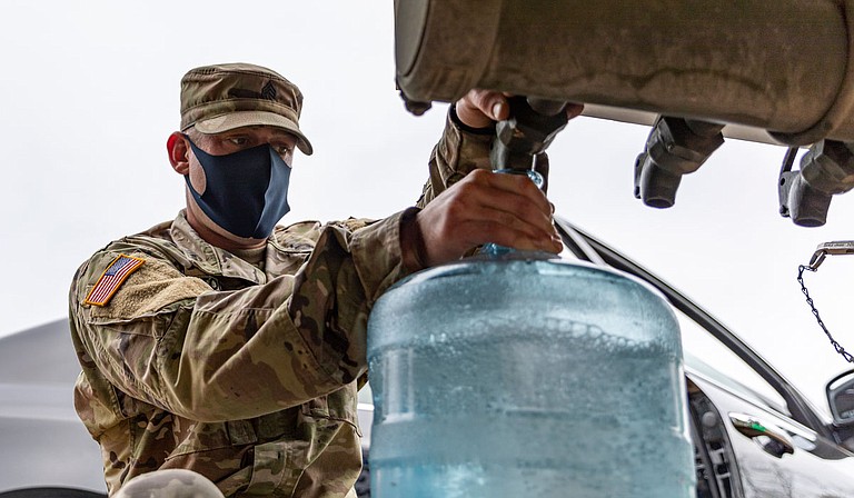 As March arrived, Mississippi National Guard members were supplying nonpotable water to Jackson residents. U.S. Army National Guard Photo by Sgt. Jovi Prevot