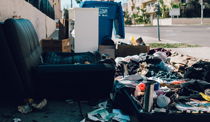 Homeless people could be hired to help cleanup massive illegal dump sites in the capital city, Jackson's mayor said. Photo by Jiroe on Unsplash