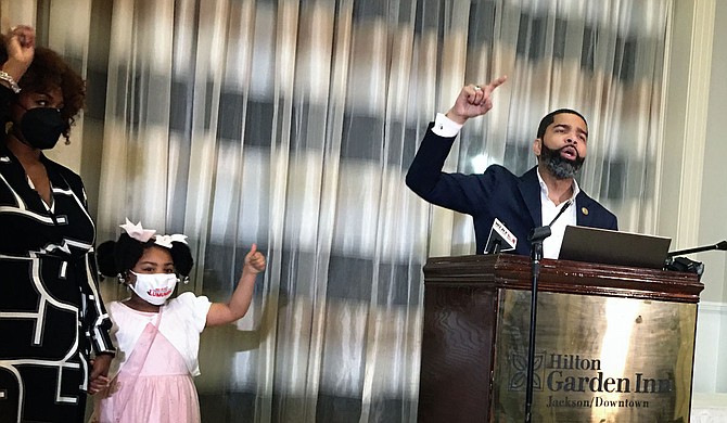 Mayor Chokwe A Lumumba, flanked by his family at the Hilton Garden Inn, celebrated his win in the Democratic Primary election Tuesday. He won with 69% of the votes. Photo by Kayode Crown