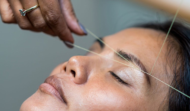 Mississippi no longer requires professional licenses for people who offer low-risk beauty services, a change that will save residents thousands of dollars and hours of time spent on training. Photo by Rune Enstad on Unsplash