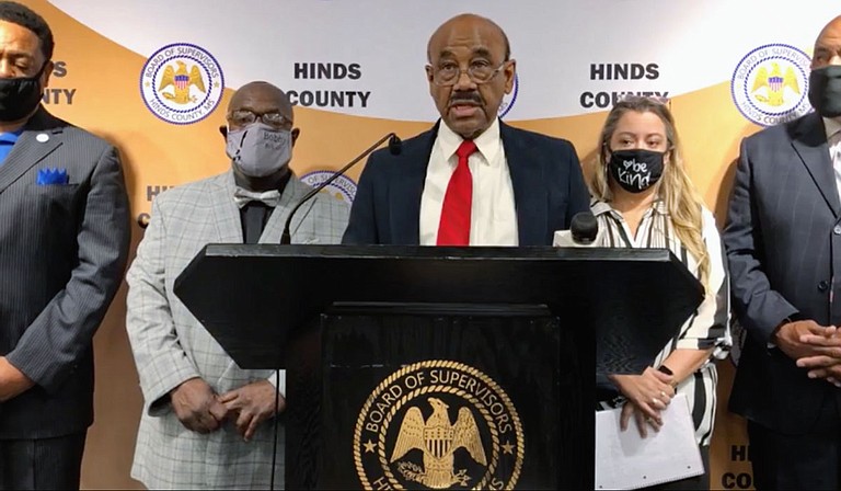 Hinds County Board of Supervisors President and District 3 Supervisor Credell Calhoun in a video posted on facebook announced emergency rental assistance for renters in the county at a press briefing on Tuesday, April 20. Also pictured, left to right: District 5 Supervisor Bobby McGowan, Program Manager Lauren Scott and Board of Supervisors Vice President and David Archie of District 2. Photo courtesy Hinds County.