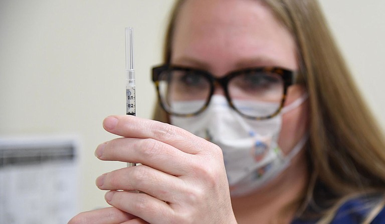 As the supply of coronavirus vaccine doses in the U.S. outpaces demand, some places around the country are finding there's such little interest in the shots, they need to turn down shipments. U.S. Air Force Photo by Kemberly Groue