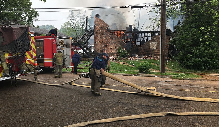 Firefighters were still on the job at an apartment complex on O’Ferrell Avenue, Jackson, as seen in this picture taken at 12:30 p.m. on Friday, April 16, 2021. Assistant Fire Chief Patrick Armon said the fire started at 10 a.m. Photo by Kayode Crown