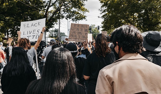 Activists with Black Lives Matter Mississippi are calling for the release of police body camera footage of what happened May 3 near Biloxi. Investigators won't say whether any officers were wearing body cameras at the time. Photo courtesy Duncan Shaffer on Unsplash