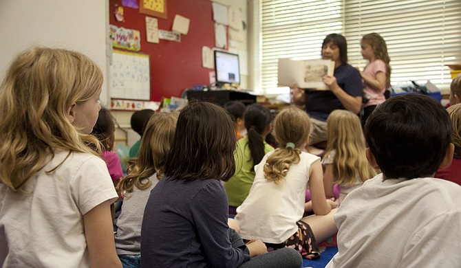 Mississippi educators will receive an average $1,000-per-year increase to their base pay starting this year. Mississippi ranks last in the nation for teacher’s pay. Photo courtesy CDC on Unsplash