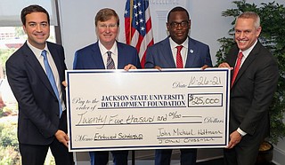 Commercial real-estate executives and business leaders John Michael Holtmann and John Crossman recently gifted Jackson State University an established real-estate scholarship. Photo courtesy JSU