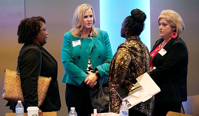 Business leaders, law enforcement officers, policy groups and government officials met at the Two Mississippi Museums to discuss ways to reduce recidivism and barriers to formerly incarcerated people having healthy, stable lives after prison. Photo by Rogelio V. Solis via AP