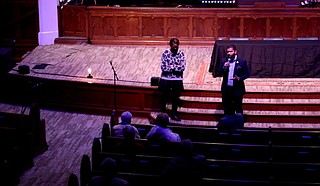 Mayor Chokwe A. Lumumba addressed people gathered at Fondren Church on Thursday, Nov. 11, for a town hall on the City’s garbage-disposal contract process. City Attorney Catoria P. Martin stands beside him. The City will hold another town hall 6 p.m. today, Nov. 18, at New Horizon Church on Ellis Avenue. Photo courtesy City of Jackson