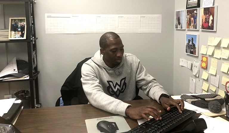 Dedrick Burnett, head coach of the Mississippi University of Women men's and women's cross country, indoor track and field, and outdoor track and field teams, assists the athletic department in a variety of other ways as well. Photo by Tom Rysinski / The Commercial Dispatch