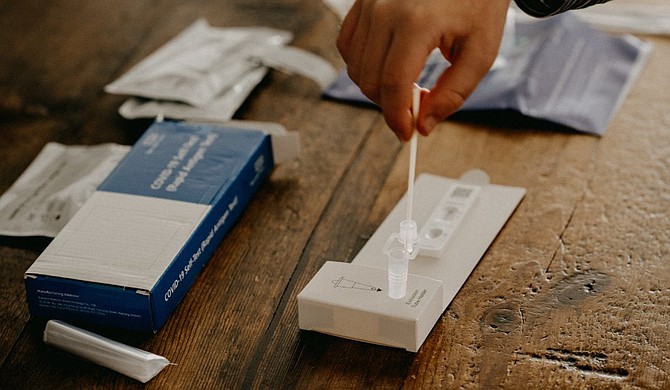 Americans may now claim two orders of COVID-19 test kits per residential address for a total of eight kits, free of charge. Four kits were previously made available in January, though only one additional order may now be placed if a household claimed that initial set. Photo courtesy Annie Spratt on Unsplash