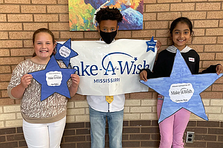 From left: Hayes Moores, Marco Harris and Tavleen Naur are students in Oakdale Elementary’s Venture program who made stars for their school’s Make-A-Wish fundraiser in honor of classmate Ariel Hurley. Photo courtesy Oakdale Elementary