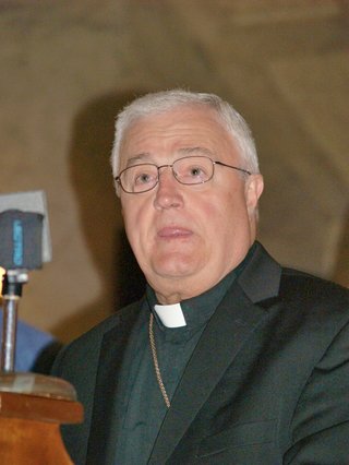 Fr. Joseph Latino believes a federal law mandate that religious groups pay for birth control violates Catholics' beliefs.