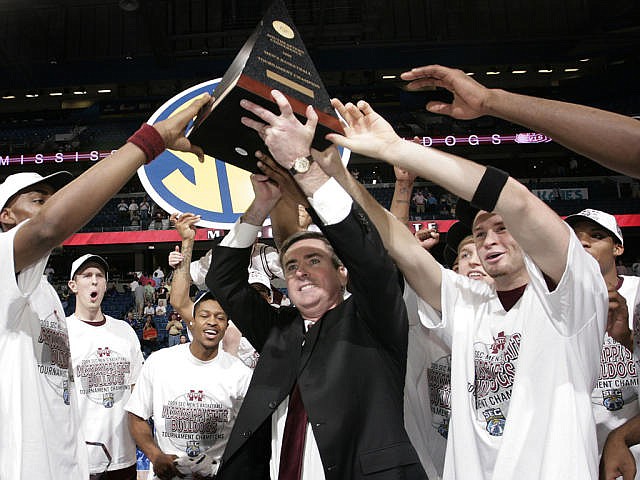 Mississippi State coach Rick Stansbury and the Bulldogs celebrate after winning the SEC Tournament and a trip to the NCAA Tournament.