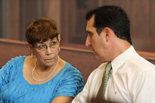 Joyce Jackson and attorney John Reeves listen to Judge Richard McKenzie during the Ward 3 election challenge hearing Monday.