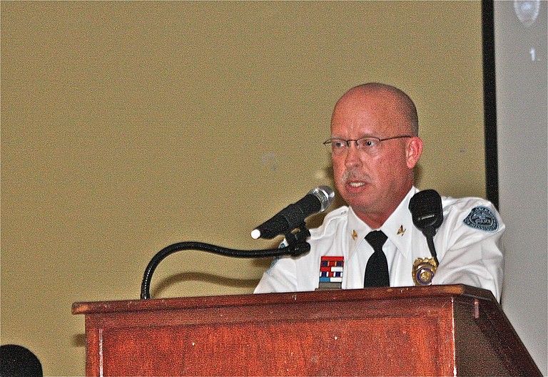 Commander Wendell Watts speaks at the Precinct 4 redistricting ceremony at Fondren Hall Monday.