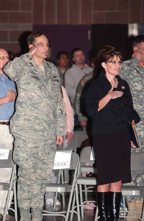 Alaska Gov. Sarah Palin salutes during the playing of the National Anthem at the official homecoming ceremony for Bravo Company, 297th Support Battalion at Fort Richardson on May 1.