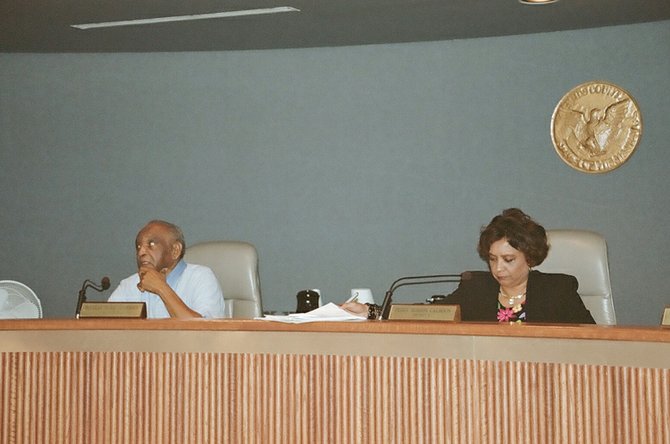 Hinds County Supervisors, including Doug Anderson (left) and Peggy Calhoun (right), are mulling how to deal with more than $10 million in budget increases requested by county department heads this week.