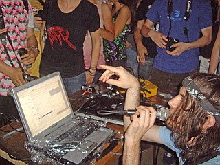 Gregg Gillis, a.k.a. Girl Talk, sound checks at the Thirsty Hippo in Hattiesburg before beginning his set.