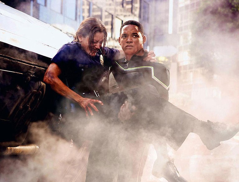 Will Smith (right) plays an unlikely, unconventional super hero in "Hancock."