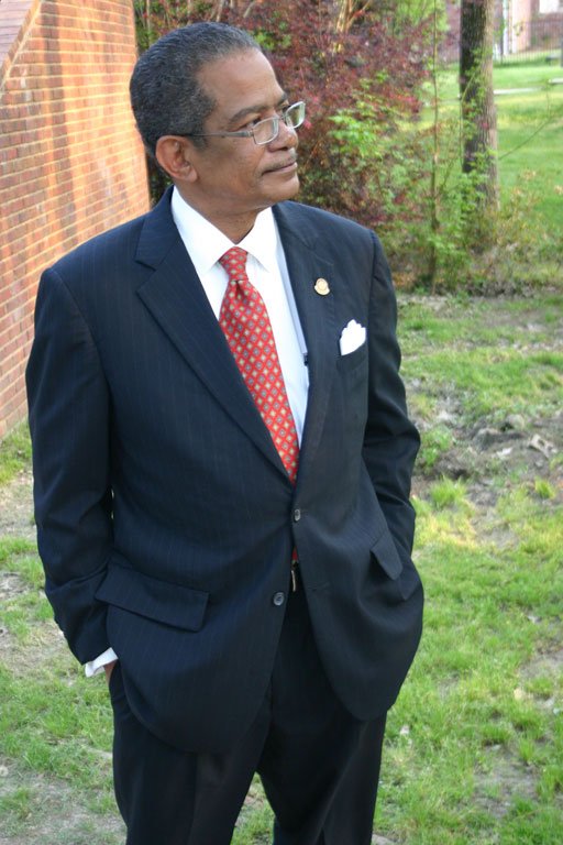 Mayor Frank Melton stands outside of his house, which has a large addition he hasn't reported.