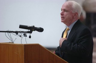 Sen. John McCain spoke during the Multi-National Force Iraq Reenlistment, naturalization and Independence Day ceremony at Camp Victory, Iraq in July 2007.