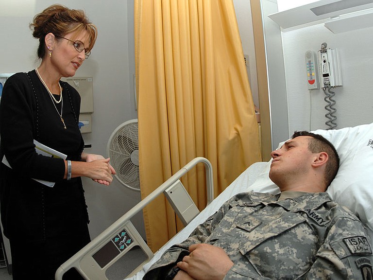 Gov. Sarah Palin visited Army Private James Pattison during a July 2007 morale tour at Landstuhl Regional Medical Center in Germany. John McCain voted against expanding veterans' education benefits.