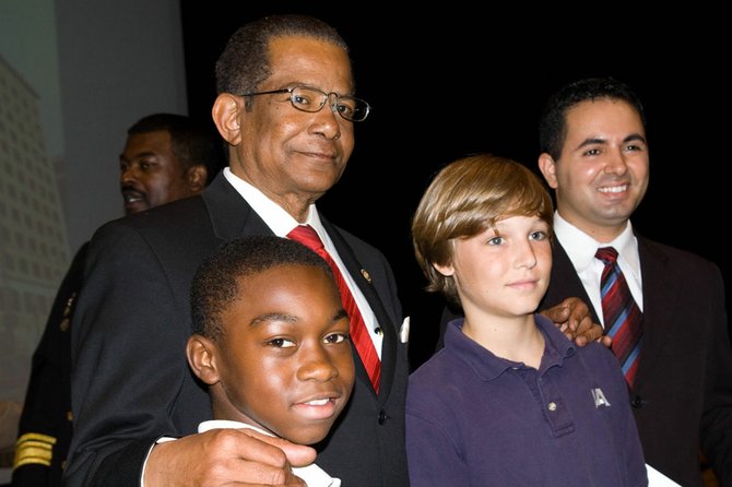 Jackson Mayor Frank Melton with (l to r) Wilkins Elementary student Jaylin Whitlock, Jackson Academy student Teyton Adams and Jackson State University student Carlos Morales.