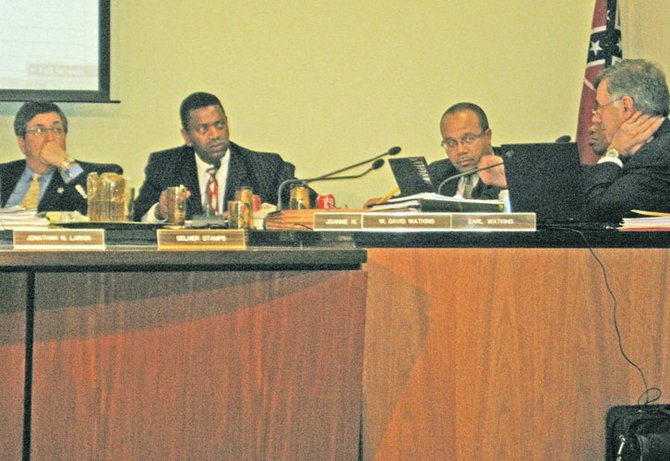 Jackson School Board President Delmer Stamps (center) may have joined with other board members in an authorized school meeting May 6. Pictured are Board Vice President Jonathan Larkin (left) and JPS Superintendent Earl Watkins (right).