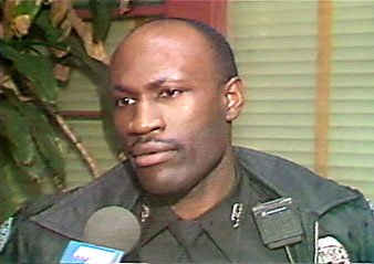 Officer R. J. Washington was killed in 1995. DA Robert Smith now alleges a "cover-up" in his murder.