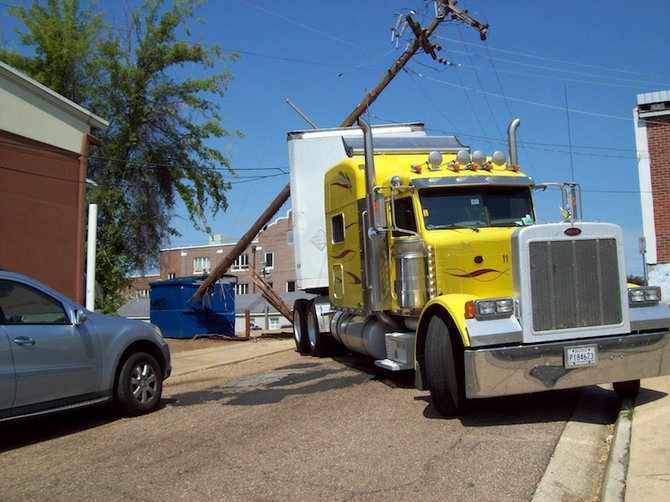 A semi backed into a light pole in Fondren, pulling the plug on some local businesses.